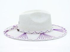 White Palm Straw Hat with Purple TCU Inspired Design on Brim by Corazon Playero. Custom designed and hand made hats by artisans in San Jose Del Cabo, Mexico. These hats are one size fits most with an elastic band inside to add comfort and fit for all head sizes. Each hat has a 3-4 week turnaround. Please note, all hats come with natural braid unless custom braid is purchased. Coastal Brimmed Toquilla Straw Hat, Toquilla Straw Panama Hat With Upf 50+ For Rodeo, Multicolor Hand-painted Straw Hat For Vacation, Custom-designed Brimmed Straw Hat For Beach, Embroidered Baseball Cap For Beach, One Size Fits Most, San Jose Del Cabo Mexico, Beach Heart, Custom Made Hats, Cabo Mexico