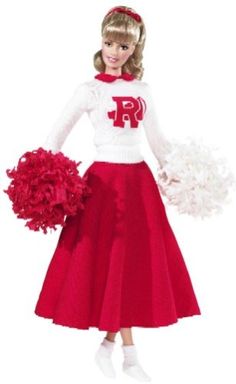 a barbie doll dressed in a cheerleader outfit with pom poms on her head