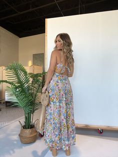 Details V Neckline Open Back Floral Midi/Maxi Dress with Adjustable Straps and Back Tie Color: Bay Multi Material: Woven Size Runs True to Size Model is Wearing a Size Small Model Measurements Size: 4 Height: 5'2" Weight: 135lbs Bust: 35" Waist: 28" Hips: 37" Bra Size: 34C Boho Pants, Tie Colors, Midi Maxi Dress, Floral Maxi, Cropped Tank Top, Floral Maxi Dress, Model Measurements, Jumpsuit Dress, Denim Skirt