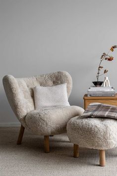 a chair and ottoman in a living room