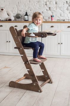 "Goodevas Wooden Toddler High Chair is the ultimate solution for parents who are in desperate need of a safe space for their child to stay while they are busy in the kitchen or doing any other house chores. SIZE: ⭐Height 33.46\" (85 cm) ⭐Width 17.7\" (45 cm) ⭐Depth 7\" (18 cm) It grows with the child, with adjustable seat and foot step CHOOSE COLOR: ⭐Light wood(Beige) ⭐Dark wood(Choco) BENEFITS: ⭐ Step Stool has all the features of a true Montessori Tower - designed to help focus your child's at Wood High Chair, Macrame High Chair Banner, Baby Chair Design, Wooden Basket Baby Shower, Birthday Candle Wood Holder, Baby Shower Wooden Gift Basket, Wood High Chairs, Toddler High Chair, First Birthday Candle