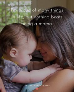 a woman holding a baby in her arms with the caption i'm proud of many things in life, but nothing beats being a mama