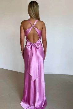 A luxurious backless maxi dress with a satin finish and flattering rushed detailing. Its elegant design and flowing silhouette make it perfect for a sophisticated. Details: Elasticity: Medium Stretch Fabric Type: POLYESTER Silhouette: Sheath Neckline: V-Neck Material: POLYESTER