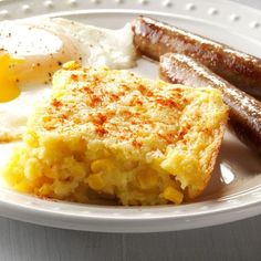 breakfast plate with eggs, sausage and hash browns