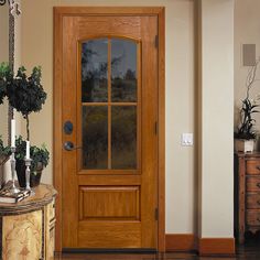 Architectural Collection is a premium line of fiberglass entry systems with authentic woodgrain replication that's virtually indistinguishable from real wood. The door slab and system components are clad in the same high quality, artisan-finished fiberglass material, creating a beautifully consistent appearance. The strength of fiberglass helps these doors withstand all climates - hot or cold, wet or dry - while resisting dents, cracks, warping, and splitting. And each system is engineered with features that add strength, reliability, and exceptional performance. JELD-WEN 36-in x 80-in x 4-9/16-in Fiberglass 3/4 Lite Left-Hand Inswing Mocha Stained Prehung Front Door with Brickmould Insulating Core in Brown Left Hand Door, Ranch Back Door, Lowes / Exterior Doors With Oval Glass, Parota Wood Doors, Therma Tru Front Door Wildflower Honey, Farmhouse Front Door With Frosted Glass, Fiberglass Front Door With Storm Door, Oak Glazed Front Door, Front Door Beveled