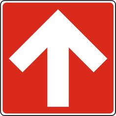 a red and white sign with an arrow pointing to the right