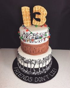 a cake that is decorated with waffles and the number fifteen on it's side