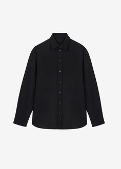 Color: Black Lightweight breathable shirting fabric Oversized fit Pointed collar Button front closure Button cuffs 65% Tencel 25% Rayon 10% Wool Dry Clean By The Frankie Shop. Imported Product Measurements: XS/S- 21" Shoulder, 49" Bust, 29" Length M/L- 21.5" Shoulder, 51" Bust, 29.5" Length Model is 175cm/5'9" wearing size XS/S Black Long Sleeve Top With Concealed Placket, Black Long Sleeve Tops With Hidden Button Closure, Black Long Sleeve Top With Hidden Button Closure, Black Office Shirt With Concealed Placket, Sleek Long Sleeve Shirt With Concealed Placket, Timeless Long Sleeve Tops With Concealed Placket, Business Long Sleeve Tops With Concealed Placket, Classic Black Shirt With Hidden Button Closure, Sleek Collared Shirt With Button Cuffs