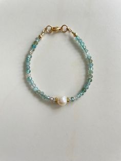 The One Aquamarine Bracelet Apatite Bracelet, Beady Eye, Aquamarine Bracelet, Stone Feature, Aquamarine Jewelry, Layered Jewelry, Jewelry Bracelet, Natural Aquamarine, Pearl Bracelet