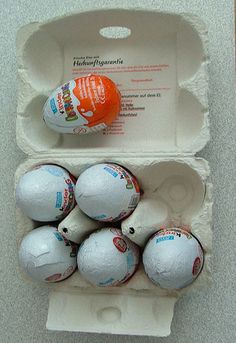 an egg carton with six eggs in it