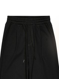 This product combines a relaxed fit with a structured design to create a versatile piece suitable for various occasions. The pants feature a comfortable elastic waistband and adjustable drawstring for a personalized fit. A seamless blend of functionality and style, these pants are an essential addition to any wardrobe. - These pants boast deep pockets, blending practicality with sleek design.- The elasticated cuffs offer a snug fit and highlight the shoe wear.- Crafted from premium fabric, the pants offer all-day comfort without sacrificing durability.- Their minimalist design allows for easy integration into a multitude of outfits, making them a staple for any fashion-conscious individual. Structured Design, Of Outfits, Jogger Pants, Snug Fit, Sleek Design, Black Pants, Minimalist Design, Relaxed Fit, Wardrobe