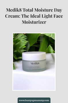 A jar of Medik8 Day Cream placed on a white surface, surrounded by lush green foliage, highlighting its lightweight moisturizing formula. Light Moisturizer, Day Cream, Face Moisturizer