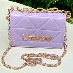 Bebe Purple & Gold Crossbody Bag Brand: Bebe Color: Purple & Gold New With Tags Purple Prom Purse, Purple Chain Strap Bag For Daily Use, Purple Crossbody Bag With Chain Strap, Purple Shoulder Bag With Chain Strap, Chic Purple Shoulder Bag With Chain Strap, Chic Lavender Crossbody Shoulder Bag, Light Purple Bag, Light Purple Purse, Aaron Mercury