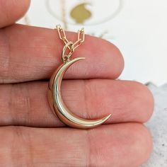 "Bold yet minimal this crescent pendant comes in waning moon phase although we can design it in any moon phase so don't hesitate to ask for quote.  The necklace can be bought as a standalone pendant or a full necklace with a high-quality Italian imported cable chain. Prefer a larger or thicker crescent or would you like to add another symbol or some text? We can make whatever you have in mind! Send us a message now for a no-obligation quote. :) DETAILS - Made in NYC, USA in our family studio. - 24mm long (without bail) and maximum thickness is 3.5mm. Contact us for larger dimension. - 3.4 grams in 14k. - High polish (if you want satin/brush finish leave a note about this in notes section at checkout) - Buy as standalone pendant or with chain as a necklace. - Optional chain is a Italian imp 14k Gold Moon Shaped Tarnish Resistant Jewelry, Celestial Style 14k Gold Half Moon Jewelry, Crescent Jewelry With Polished Finish For Gifts, Tarnish Resistant 14k Gold Moon Jewelry, Everyday Crescent Yellow Gold Jewelry, Minimalist Jewelry With Moon Charm, Celestial Half Moon 14k Gold Jewelry, Everyday 14k Gold Crescent Jewelry, Everyday 14k Gold Moon Jewelry