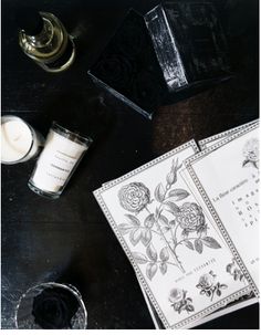 a table topped with candles and napkins