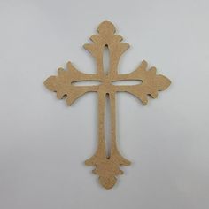 a wooden cross on a white background