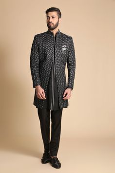 (Please leave a NOTE with your PHONE NUMBER, as it's required by the carrier). Top Details Color- Black With Grey Embroidery , Fabric - Suiting Fabric Bottom Details Color- Black, Fabric - Suiting Fabric , Style -Pant Package Include :INCLUDES 1 SHERWANI,1 KURTA AND 1 PANT. Turban ,Mojari And Other Accessories Are Not Sold Along With The Dress. CARE: DRY CLEAN ONLY Additional Information : - As This Sherwani/Waistcoat/Kurta Are Made As Per Orders So It Is Strictly Not Acceptable Once Get Deliver Designer Nehru Jacket With Mirror Work For Weddings, Traditional Black Suits For Ceremony, Designer Traditional Wear With Mirror Work For Wedding, Designer Wedding Traditional Wear With Mirror Work, Designer Embroidered Sherwani For Ceremony, Black Suit For Wedding And Eid, Black Wedding Suit For Eid, Black Suits For Wedding Eid Occasion, Designer Festive Sherwani For Ceremony