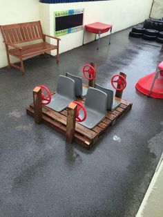 there are two benches and three chairs on the floor