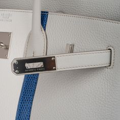 very rare limited edition Hermes Birkin 35 Club bag featured Gris Perle.Exquisite Gris Perle and white Clemence leather is accentuated with rich blue Mykonos Lizard.Palladium Hardware.Comes with sleepers, lock, keys and clochette.NEW or NEVER .final saleBAG MEASURES:LENGTH 35 cm / 14"TALL 25 cm / 10"DEEP 18 cm / 7"HANDLES:TALL 5"CONDITION:NEW or NEVER Will be delivered with Box, dust bag, card, booklet and receipt Exchange Accepted in this cases :/p> Limited Edition Bag, Hermes Birkin 35, Hermes Shoes, Jimmy Choo Sunglasses, Fendi Shoes, Louis Vuitton Shoes, Chanel Shoes, Gucci Shoes, Hermes Birkin