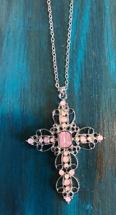 Pink Crystal Cross Necklace Cheap Pink Cross-shaped Jewelry, Pink Rhinestone Pendant Necklace, Crystal Rhinestone Cross Necklace For Gift, Crystal Rhinestone Cross Necklace Perfect For Gifts, Crystal Rhinestone Cross Necklace As Gift, Pink Cross Pendant Jewelry As Gift, Pink Cross Pendant Necklace For Gift, Pink Rhinestone Pendant Jewelry, Pink Cross Necklace For Gifts