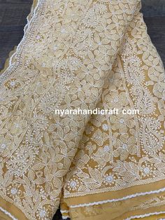 Beautiful Chikankari (famous hand embroidery style from Lucknow, City of Nawabs, India) on georgette. Designer embroidery all through the saree. Includes an embroidered blouse piece too. Fall Attached and Petticoat included!! Yellow Semi-stitched Chikankari Embroidered Fabric, Georgette Traditional Wear With Floral Embroidery For Ceremonies, Floral Embroidery Georgette Traditional Wear For Ceremonies, Floral Embroidered Georgette Traditional Wear For Ceremonies, Festival Georgette Fabric With Chikankari Embroidery, Traditional Ceremonial Fabric With Chikankari Embroidery, Traditional Georgette Fabric With Floral Embroidery, Intricate Embroidery On Georgette Fabric For Festivals, Ceremonial Chikankari Embroidered Fabric