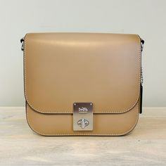 Coach Hutton Saddle Bag In Taupe Colorblock, Nwt! Never Used. Comes With Tags And Dustbag. Refined Calf Leather Inside Zip And Multifunction Pockets Turnlock Closure, Fabric Lining Outside Slip Pocket Adjustable Strap With 21 1/2" Drop For Shoulder Or Crossbody Wear 7 3/4" (L) X 7" (H) X 3" (W) Style No. 609 Classic Shoulder Bag With Turn-lock Closure For Shopping, Beige Rectangular Bag With Turn-lock Closure, Classic Satchel With Silver-tone Hardware For On-the-go, Classic Box Bag With Silver-tone Hardware For Everyday Use, Classic Box Shoulder Bag With Silver-tone Hardware, Classic Shoulder Bag With Silver-tone Hardware, Classic Shoulder Box Bag With Silver-tone Hardware, Classic Crossbody Box Bag With Branded Hardware, Classic Rectangular Box Bag With Silver-tone Hardware