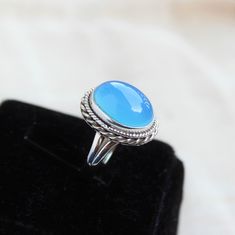 Gemstone - Blue Chalcedony Gemstone size - 12x16 mm oval shape Metal - Sterling Silver Ring Size- All sizes available Each Ring made with Precision and love, these rings are perfect for everyday use and a perfect accessory to wear at work. Rings can be customized on request and gemstone can be switched to any other as per requirement. kindly visit my store to view the complete collection. Feel free to contact me for any queries regarding jewelry or for bulk order. The ring will be gift wrapped i Blue Oval Adjustable Ring, Blue Oval Cabochon Opal Ring, Oval Blue Cabochon Rings, Blue Topaz Oval Cabochon Ring Gift, Blue Oval Cabochon Topaz Ring Gift, Blue Chalcedony Cabochon Rings, Oval Blue Cabochon Jewelry, Blue Oval Cabochon Jewelry, Adjustable Blue Moonstone Ring With Cabochon