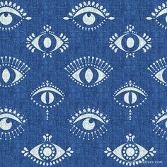 blue and white fabric with an eye pattern