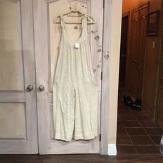 Free People Tie Me Up Jumpsuit Wide Leg Tie Shoulder Straps Oatmeal New With Tags * Size: Extra Small Retail Price: $148.00 * There Is A Line Through The Tag To Prevent Store Return Cotton 34'' Around Bust 26" Inseam Beige Linen Casual Jumpsuits And Rompers, Beige Linen Overall Jumpsuits And Rompers, Linen Jumpsuits And Rompers For Loungewear, Beige Linen Overalls Jumpsuit, Beige Casual Jumpsuits And Rompers For Daywear, Casual Beige Jumpsuits And Rompers For Daywear, Summer Cream Overall Jumpsuits And Rompers, Beige Linen Jumpsuits And Rompers For Loungewear, Casual Cream Jumpsuits And Rompers For Loungewear