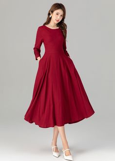 "Give you a color of red this linen midi dress, design in fit and flare silhouette with puffy sleeve cuffs and swing skirt, both chic and modest in style that you can wear with ornaments as belt, earings, bags..in any you love to suit every life occasion. DETAIL * 50% Linen, 50% cotton * Two side pockets * Long Lantern Sleeve * Fit and flare dress * Right zipper closure * Perfect for summer, spring, autumn * Dry clean MODEL SIZE Bust 85 cm(33.4\") Waist 67 cm(26.7\") Height 168cm (5' 6\") She wears size XS CUSTOM MADE SERVICE If you * Change other color * Can't find your size in our size Chart * Change the length * Your Height is not Between 5'1\" - 5\"9\" * Your weight is not Between 47 kg - 67kg I can do it for you, It will need some extra fee depending on on your need. Contact with me f Elegant A-line Linen Dress With Pockets, Spring Red Midi Dress With Pockets, Solid A-line Dresses With Pockets, Solid Color A-line Dress With Pockets, Solid Color Linen Midi Dress, Cotton A-line Midi Dress In Solid Color, A-line Dress With Pockets, Red Maxi Dresses With Pockets, Red Spring Maxi Dress With Pockets