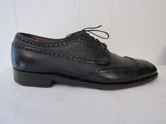 "Vintage 1950s 60s black Ranch Oxhide leather wing tip shoes. Lace up. High quality, made in England By Church's. Size 9. The soles measure 11.75\" long and 4.25\" wide. Shoes are in very good condition with some minor scratches." Vintage Black Oxfords With Almond Toe, Vintage Black Almond Toe Oxfords, Retro Formal Leather Shoes With Brogue Detailing, Retro Leather Shoes With Brogue Detailing For Formal Occasions, Vintage Black Wingtip Leather Shoes, Vintage Black Oxfords For Office, Retro Wingtip Oxfords For Business, Vintage Black Leather Shoes For Work, Retro Black Wingtip Oxfords