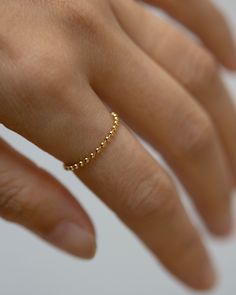 Available in 14K gold filled.  Modern and timeless Bead Band Ring Perfect as a stacking ring or by itself. # Statement rings chain ring thick chain  gold chain rings statment ring cuban link chain 14K gold filled everyday ring jewelry rings  ■ SHIPPING UPGRADES You can find shipping upgrades options in the drop bar menu when you check out.  * Within the U.S Regular First-class : 2-6 business days Priority : 2-3days Express : 1-2 days * International International Priority : 6-10 Business days Ru Minimalist Gold Ring With Delicate Chain, Gold Dainty Minimalist Ring, Minimalist Everyday Gold Chain Ring, Everyday Minimalist Gold Chain Ring, Everyday Gold Rings With Delicate Chain, Dainty Gold Stackable Chain Ring, Dainty Gold Chain Ring For Everyday, Dainty Everyday Chain Ring, Dainty Gold Chain Ring