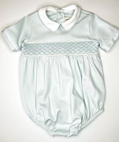 Add timeless elegance to your little one's wardrobe with our classic Collared Blue Smocked Bubble. Crafted with delicate smocking and a charming collar detail, this ensemble exudes sophistication for any special occasion. - 100% pima cotton - Available in sizes NB to 12m - Delicate details, blue smocked *Due to individual computer monitor settings, actual colors may vary slightly from those you see on the screen* Photography by Caroline Guinn Photography Smocked Baby Clothes, Screen Photography, Mignonne Gavigan, Park Designs, Scarf Hat, Delicate Details, Elizabeth And James, Womens Activewear, Sweater And Shorts