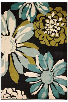 an area rug with flowers on black and green colors, including blue, yellow, white, and brown