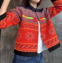 This is 100% Hand embroidered Jacket. Handmade 100% by Hmong hilltribe in Thailand. Hemp fabric which is soft and comfortable. One of a kind Jacket, super unique Size : Bust 42 inch, Length 21 inch, Sleeves 19 inches Traditional Long Sleeve Winter Blazer, Embroidered Stand Collar Outerwear For Fall, Traditional Patchwork Winter Outerwear, Traditional Outerwear With Stand Collar For Spring, Traditional Winter Outerwear With Pockets, Traditional Winter Patchwork Outerwear, Traditional Winter Outerwear With Stand Collar, Traditional Stand Collar Winter Outerwear, Traditional Spring Outerwear With Stand Collar