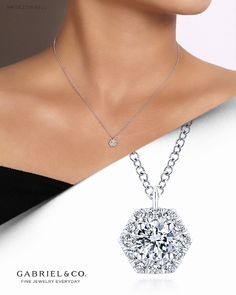 Ideal for those who love timeless styles with a twist, this 0.37ct diamond necklace truly sparkles. A central round cut diamond is intensified by a chic hexagonal halo for modern radiance. NK5623W45JJ #GabrielNY #DiamondJewelry #FineJewelry #GabrielAndCo #UniqueJewelry #FashionJewelry#GiftIdeas#UniqueGifts #DiamondJewelry #Jewelry #Necklaces #DiamondNecklace #GoldNecklace #HaloPendantNecklace Luxury Halo Design Necklaces For Women, Luxury Cubic Zirconia Diamond Necklace With Halo Setting, Luxury Halo Necklace For Gift, Luxury Classic Necklaces With Halo Setting, Luxury Octagon Halo Jewelry, Luxury Halo Necklace In Fine Jewelry Style, Luxury Engagement Necklace With Halo Setting, Luxury Necklace With Halo Design, Luxury Halo Design Necklaces