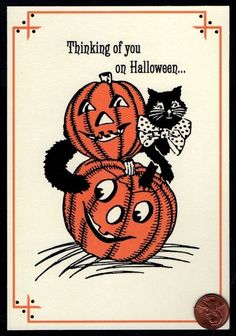 a card with two pumpkins on it and a cat sitting on top of one