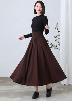 "★★ FEATURES * cotton linen skirt * with liner * Two side seam pockets * Wide elastic waistband * pleated waist detail * Plus size full skirt * A Line Skirt * Perfect for Spring Autumn * Wash by hand or machine with cold water ★★ The model is 170 cm (5′ 7″) tall with a 80 cm (31.5\") bust, 66 cm (26\") waist. She is wearing the brown linen skirt in size XS. ★★ Bespoke Order Service If you Request other color Request the length Your height is not between 155 cm- 172 cm Your weight is over 75 kg I Non-stretch Pleated Maxi Skirt For Fall, Fall Stretch Maxi Skirt With Gathered Details, Non-stretch Long Brown Skirt, Non-stretch Brown Long Skirt, Fitted Wide Leg Brown Maxi Skirt, Non-stretch Winter Flared Maxi Skirt, Non-stretch Brown Cotton Skirt, Brown Cotton Flared Skirt, Long Brown Cotton Skirt