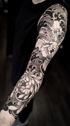 a person with a tattoo on their arm