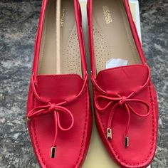 Beautiful Color For The Coming Holidays. Brand New, Not Worn. Round Toe Slip On Moccasins, Laced Bow Detail At Toe With Metallic Hardware. Crimson Red. Red Leather Flat Moccasins, Red Slip-on Moccasins For Spring, Spring Leather Loafers With Red Sole, Red Casual Moccasins With Branded Insole, Casual Red Moccasins With Branded Insole, Red Elegant Moccasins, Moccasin Flats, Basic Shoes, Flat Loafers