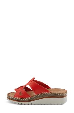 Elevate your look with these platform sandals made with supple leather and designed with cutouts along the sides. 1 3/4" heel Adjustable hook-and-loop strap Cushioned insole Leather upper and lining/synthetic sole Made in Turkey Red Buckle Closure Sandals For Beach, Red Sandals With Buckle Closure For Beach, Vacation Sandals With Red Sole And Round Toe, Red Open Toe Slingback Sandals For Beach, Red Flat Sandals With Buckle Closure, Red Closed Toe Platform Sandals, Platform Sandals With Single Toe Strap For Beach, Beach Sandals With Platform And Single Toe Strap, Leather Platform Sandals With Toe Loop