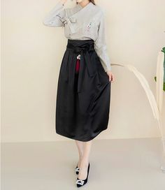 This is a Korean Modern Women's Hanbok satin skirt suitable for spring/fall and summer. This skirt is not a wrap style, but can be worn comfortably with a side zipper and elastic waistband at the back. A design that looks like the fabric itself has wrinkles is a characteristic of the fabric. Please note that this is not a reason for return. This hanbok is modernly designed so you can wear it comfortably and beautifully. This modern hanbok is perfect dress for daily and celebrations such as parti Satin Skirt For Fall Evening, Satin Skirt For Evening In Fall, Chic Satin Skirt For Fall, Fall Evening Satin Skirt, Silk Midi Skirt For Fall, Silk Flowy Skirt For Fall, Flowy Silk Skirt For Fall, Fall Silk Midi Skirt, Spring Satin Full Skirt