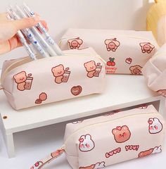 Lovely Bear Pencil Bag PN4961 ●Size:20*7*7cm ●Material:Pu ●About Shipping: We attach great importance to the orders of each customer and parcel delivery. 1.Processing time: 2-3 business days. 2.Shipping time: 10-15 business days to US, please allow 3-4 weeks shipping to other country.(Shipping times can be affected by variable customs clearance times or public holidays.) Back To School Rectangular Bag With Pen Holders, Back To School Pouch Bag With Pen Slots, Back To School Rectangular Case With Pen Holders, Large Capacity Rectangular Pencil Case For Daily Use, Trendy School Bags With Pen Slots, Trendy Rectangular Case Bag For Back To School, Trendy Bags With Pen Holders For Back To School, Rectangular White Bag With Pen Slots, Beige Travel Bags With Pen Slots