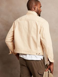 Casual and iconic, this classic trucker jacket is crafted from 100% organic cotton with a bit of stretch for comfort.  WARM: Unlined and perfect for layering.  RELAXED FIT: Almost oversized, this style is cut with extra room.  ORGANIC: Made with cert Everyday Cotton Outerwear With Double-needle Sleeve, Cotton Denim Jacket For Fall Layering, Relaxed Fit Beige Cotton Denim Jacket, Relaxed Fit Cotton Outerwear For Spring, Beige Relaxed Fit Cotton Denim Jacket, Spring Relaxed Fit Cotton Outerwear, Classic Unstructured Denim Jacket For Spring, Unstructured Utility Jacket For Everyday Spring Wear, Beige Cotton Denim Jacket With Pockets