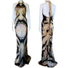 Incredible piece by Roberto Cavalli, 100% silk and made in Italy. This gown has an abstract paisley, print featuring rich, sparkly gold colors, coral pink, purple and black. Maxi length with a mermaid train hem. Low, open back cut. Front has a fitted bodice with an adjustable keyhole cutout. Hidden zipper closure at the back with a tie halter high neck. Unlined. Size Small. IN PERFECT condition. Abstract Paisley, Mermaid Style, Gold Colors, Dress Gown, Mermaid Fashion, Black Maxi, Vintage 2000s, Style Maxi Dress, Roberto Cavalli