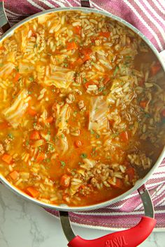 a large pot filled with food on top of a table