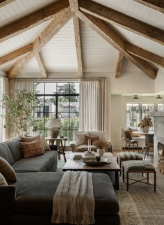 a living room filled with furniture and a fire place