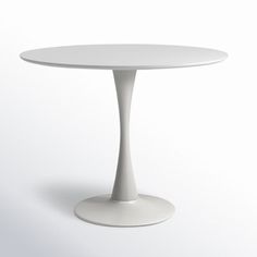 a white round table with an oval base on a plain surface, viewed from the front