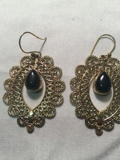 Delicate and detailed black onyx stone and Bronze earrings These dangle earrings are about 2 inch long All jewelry is shipped in a nice gift box. Check out our over a THOUSAND great reviews Bronze Earrings, Black Onyx Stone, Onyx Stone, Etsy Earrings Dangle, Black Onyx, Onyx, Crochet Earrings, Dangle Drop Earrings, Dangle Earrings