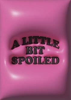 a pink pillow with the words'a little bit spoiled'printed in black on it